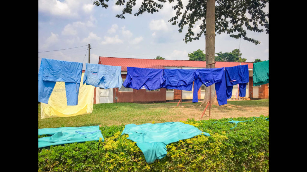 The hospital staff uniforms drying on the clothesline